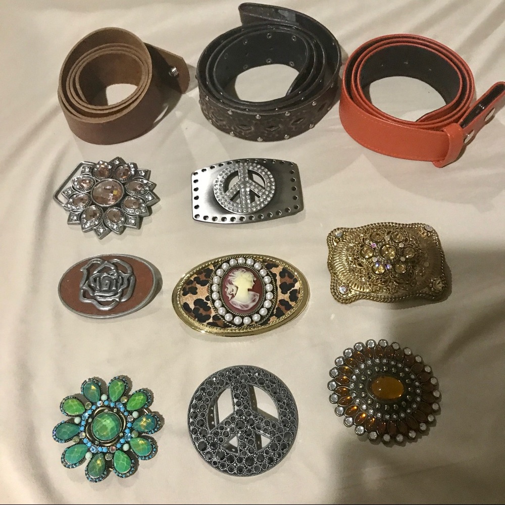 Lots of vintage belt buckles and belt straps